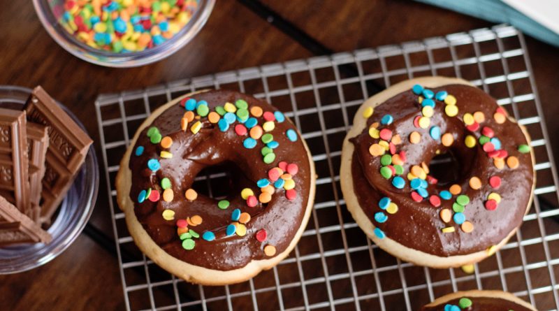 Beautifully Baked Donuts with a Chocolate Frosting Glaze and Sprinkles