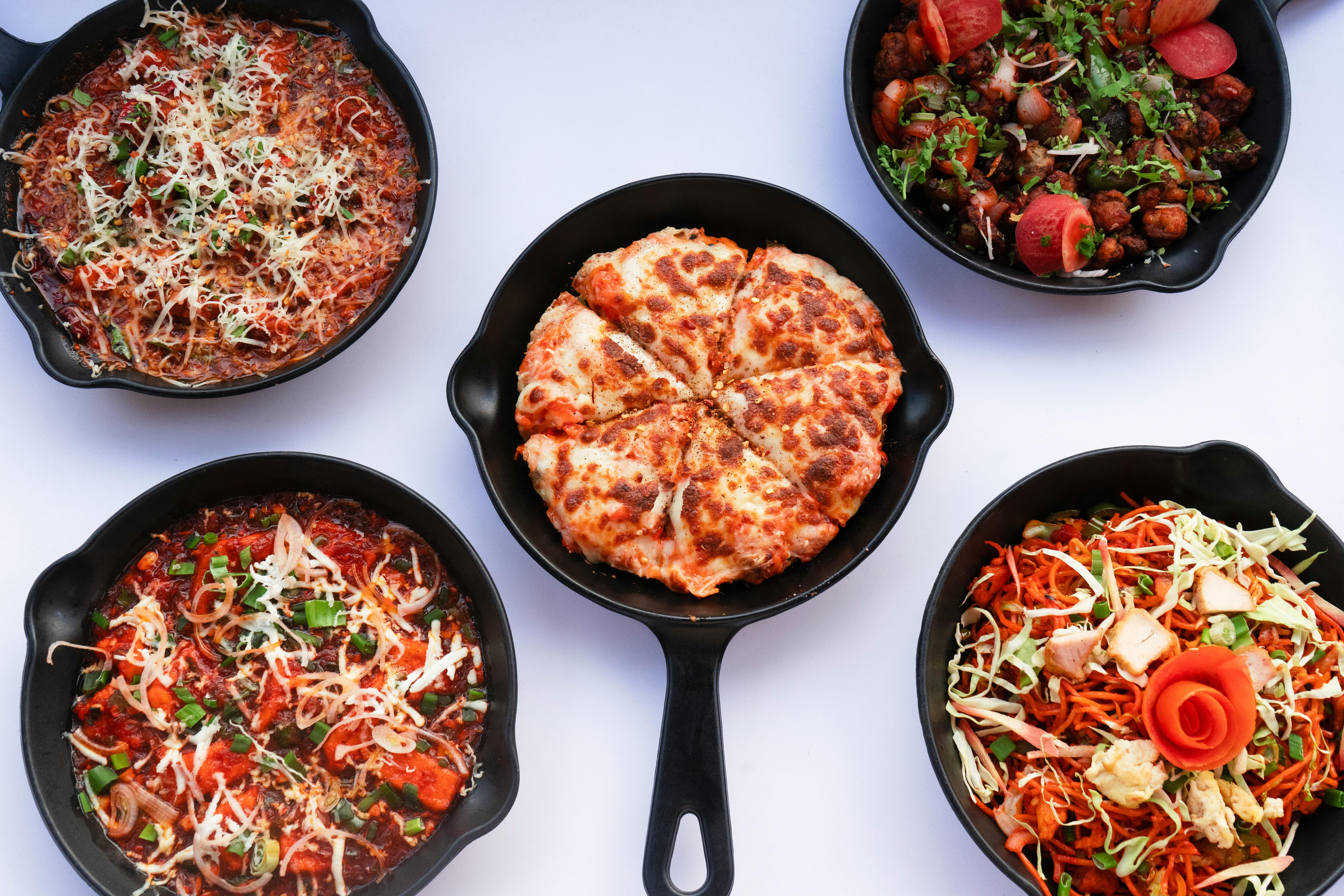 crispy reheated pizza in skillet